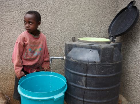 Boy with Slow Sand Filter
